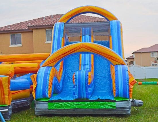 double slide obstacle with rock climbing